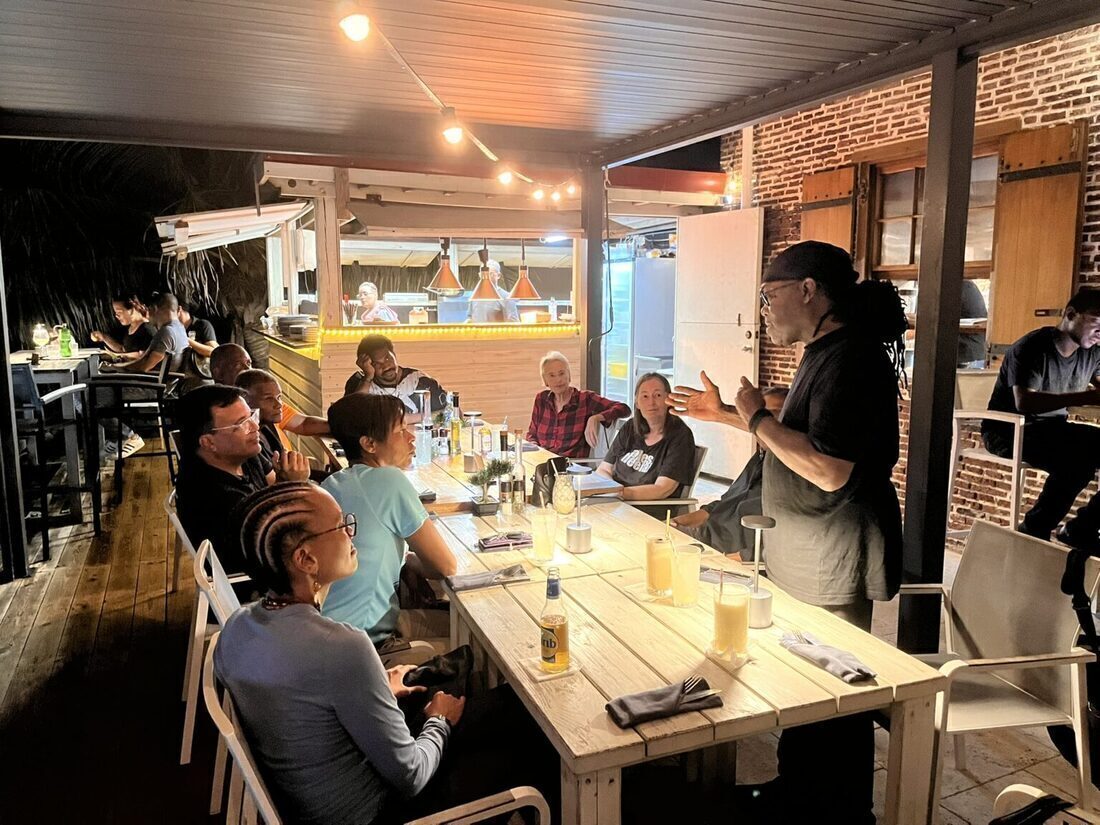 Members of the St. Eustatius Afrikan Burial Ground Alliance and collaborating partners gathering at the Old Barrel House on St. Eustatius
